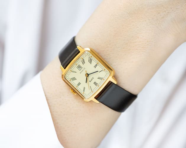 Women wearing classical wristwatch