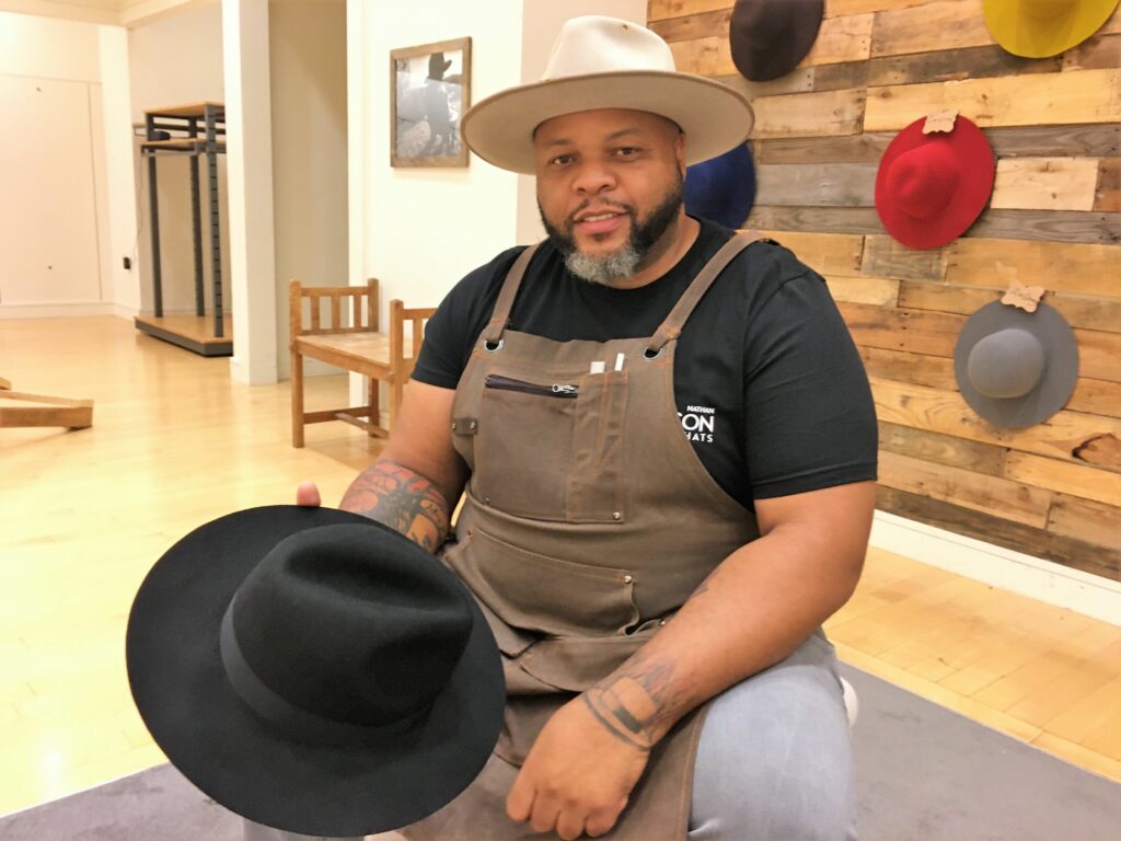 Many people envision a cowboy hat when they hear the word "cowboy." It is widely regarded as the definitive piece of Old West clothing. Cowboy hats have a high crown and a wide brim, which can be flat or shaped. Because they are made of straw, felt, or leather, you can wear them in both warm and cold weather.