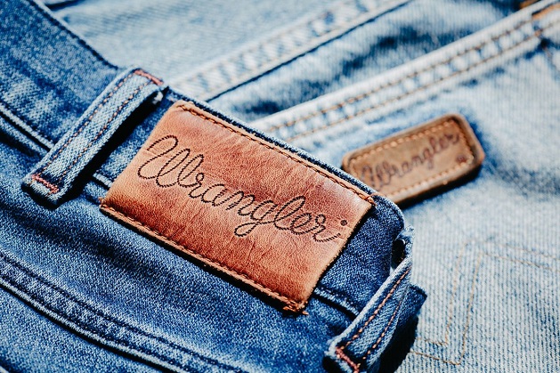 women's and men's Wrangler jeans close up