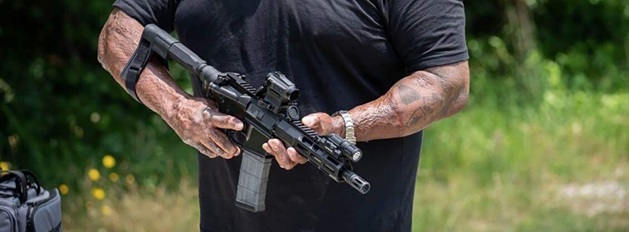 man holding a pistol